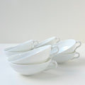 Ensemble de huit tasses à thé en porcelaine fine – Limoges, v. 1940-1950