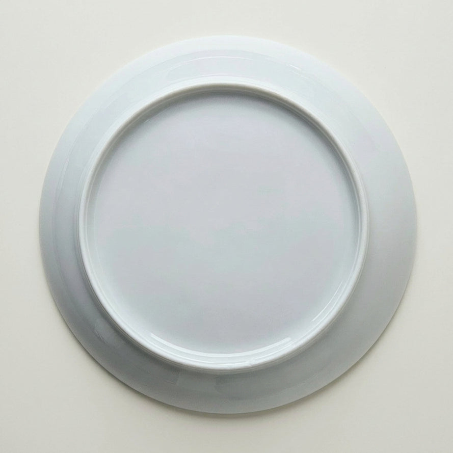 Ensemble de quatre assiettes creuses – Minéral – Manufacture Raynaud – Limoges, début du XXIe s.