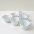 Ensemble de six tasses à café en porcelaine fine – Limoges, 2e moitié du XXᵉ s.