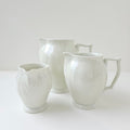 Lot de trois pièces en porcelaine émaillée ivoire – Manufacture Raynaud – Limoges, Fin du XXᵉ s.