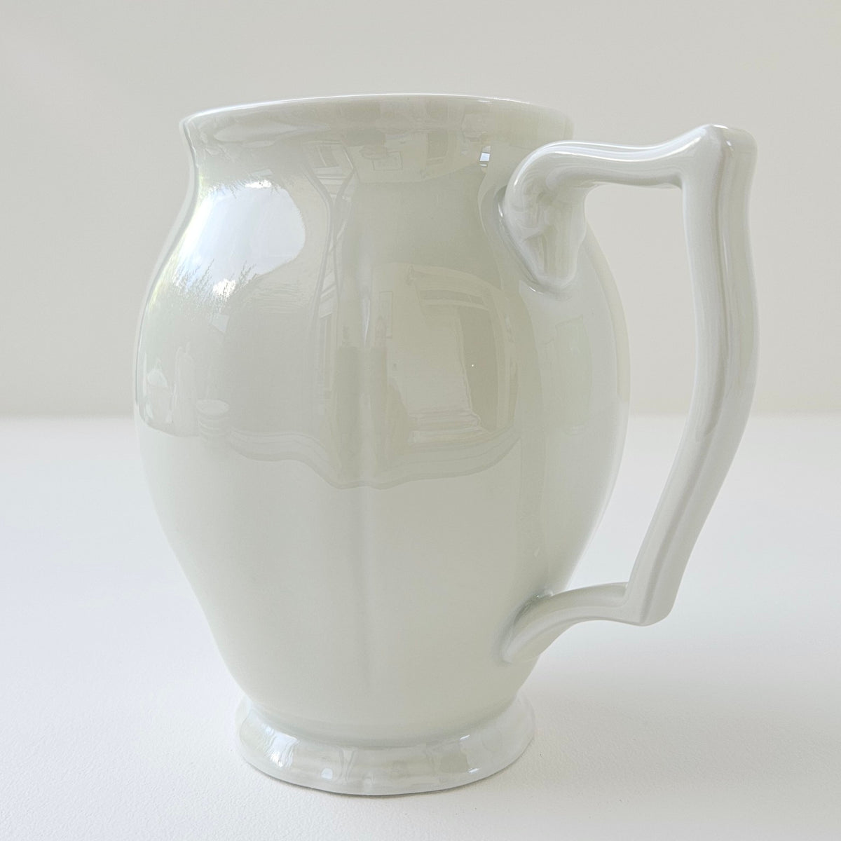 Lot de trois pièces en porcelaine émaillée ivoire – Manufacture Raynaud – Limoges, Fin du XXᵉ s.