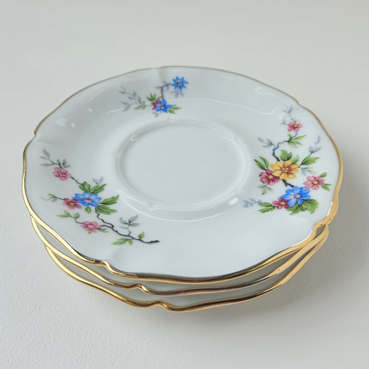 Lot de trois soucoupes anciennes – Société Porcelainière Limousine – Limoges, v. 1945-1950