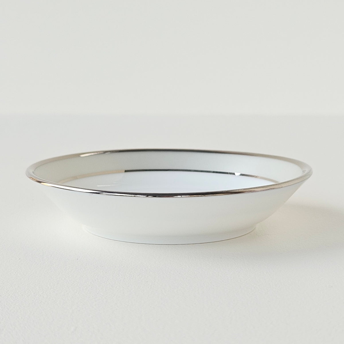Ensemble de quatre coupelles plates – Clair de Lune – Manufacture Haviland – Limoges, XXIe s.