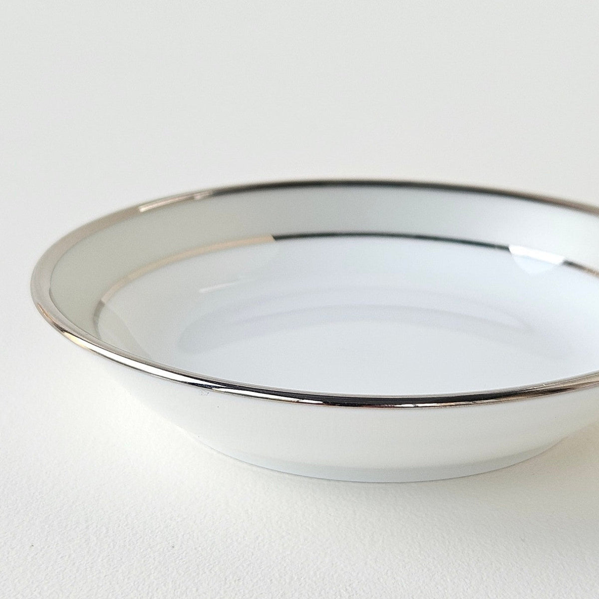 Ensemble de quatre coupelles plates – Clair de Lune – Manufacture Haviland – Limoges, XXIe s.