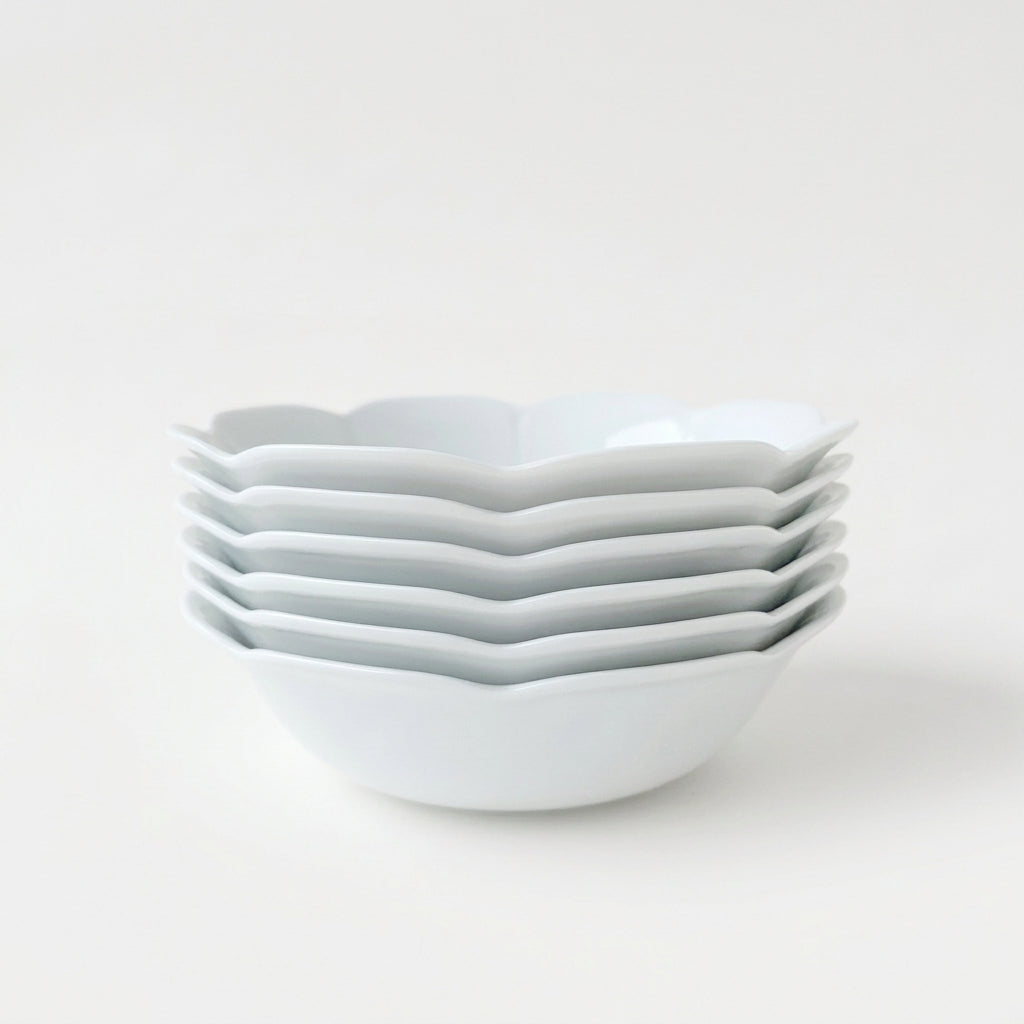 Suite de six bols à salade – Nymphéa – Manufacture Royal Limoges – Limoges, début du XXIe s.