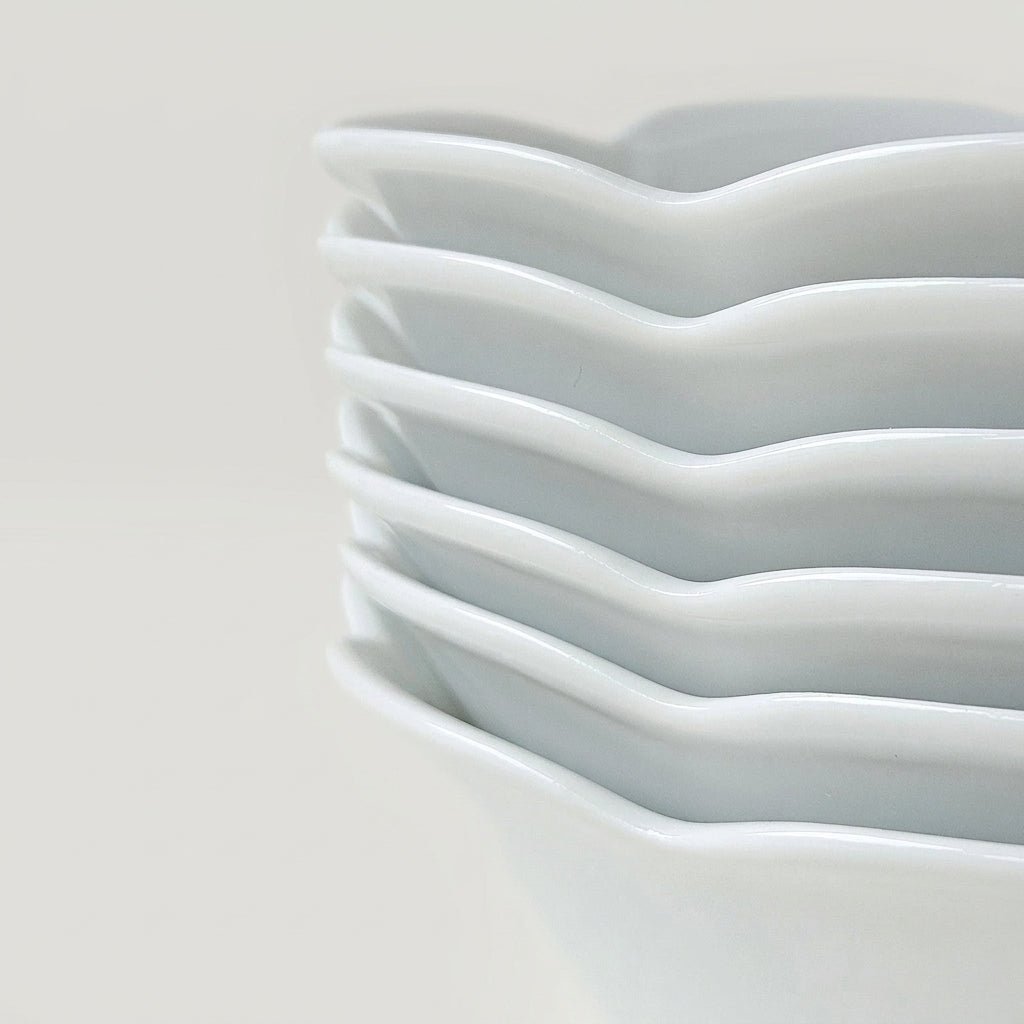 Suite de six bols à salade – Nymphéa – Manufacture Royal Limoges – Limoges, début du XXIe s.