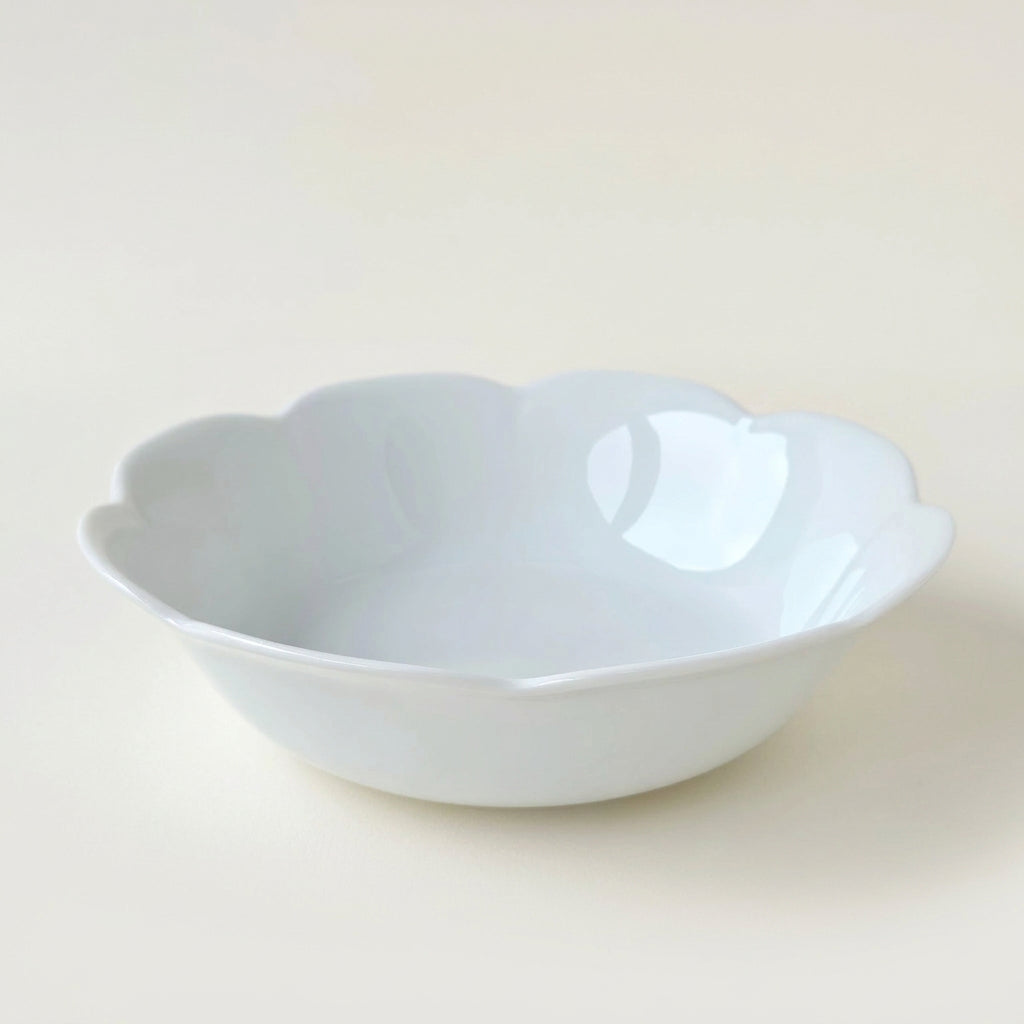 Suite de six bols à salade – Nymphéa – Manufacture Royal Limoges – Limoges, début du XXIe s.