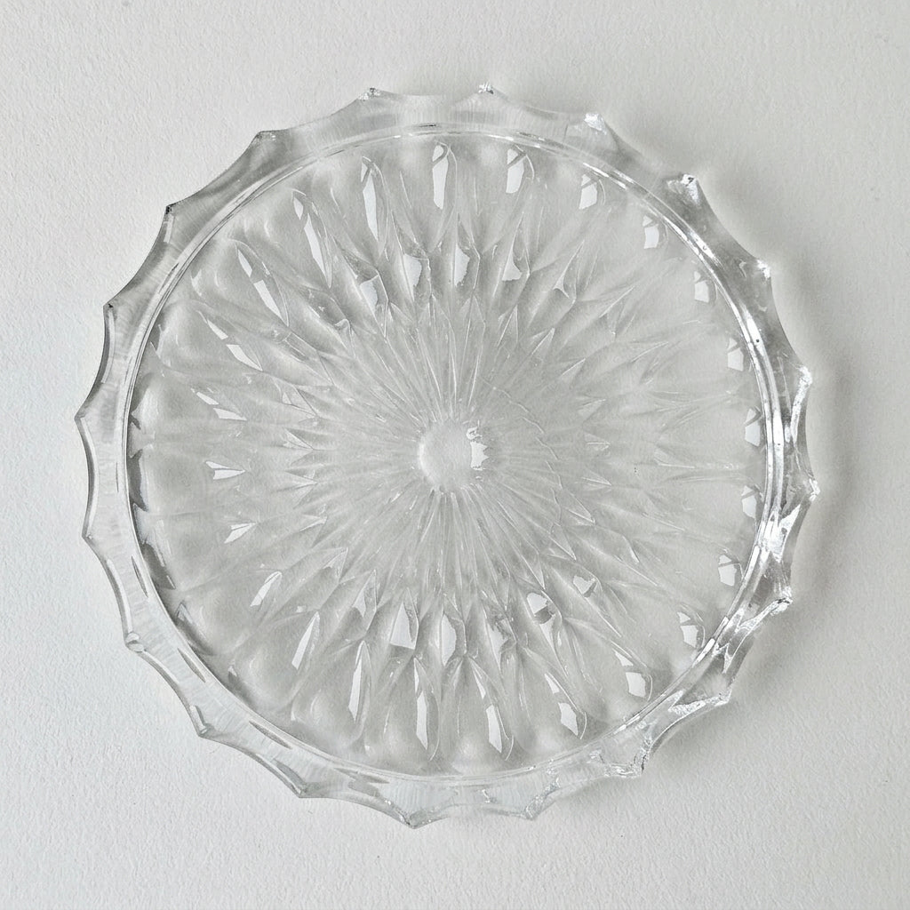 Dessous de bouteille en verre moulé à décor étoilé – XXᵉ siècle