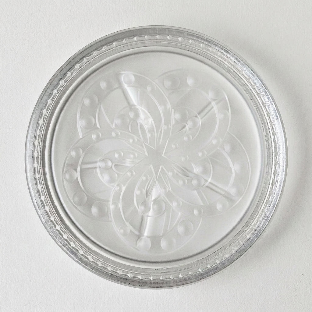 Dessous de bouteille en verre moulé et sablé – XXᵉ siècle