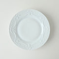 Suite de quatre assiettes à dessert – Manufacture Lafarge – Limoges, v. 1963-1970