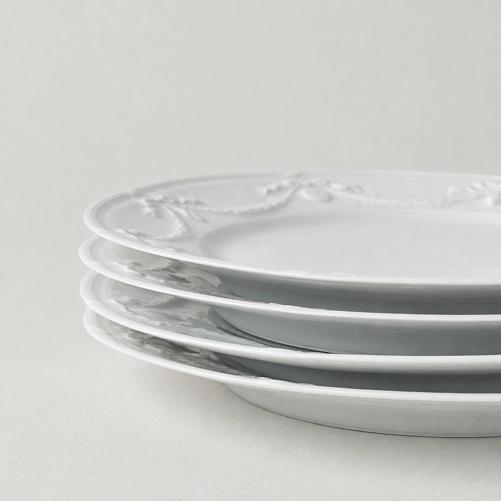 Suite de quatre assiettes à dessert – Manufacture Lafarge – Limoges, v. 1963-1970