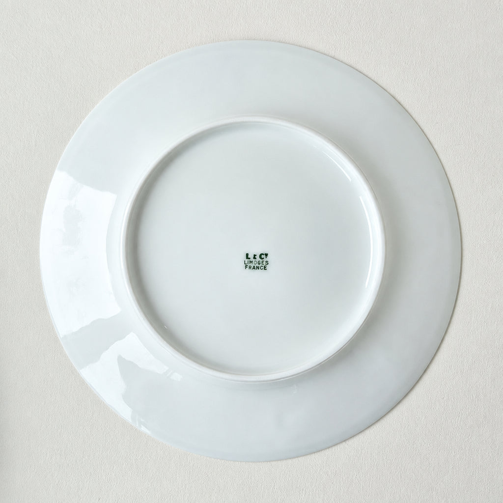 Suite de quatre assiettes à dessert – Manufacture Lafarge – Limoges, v. 1963-1970