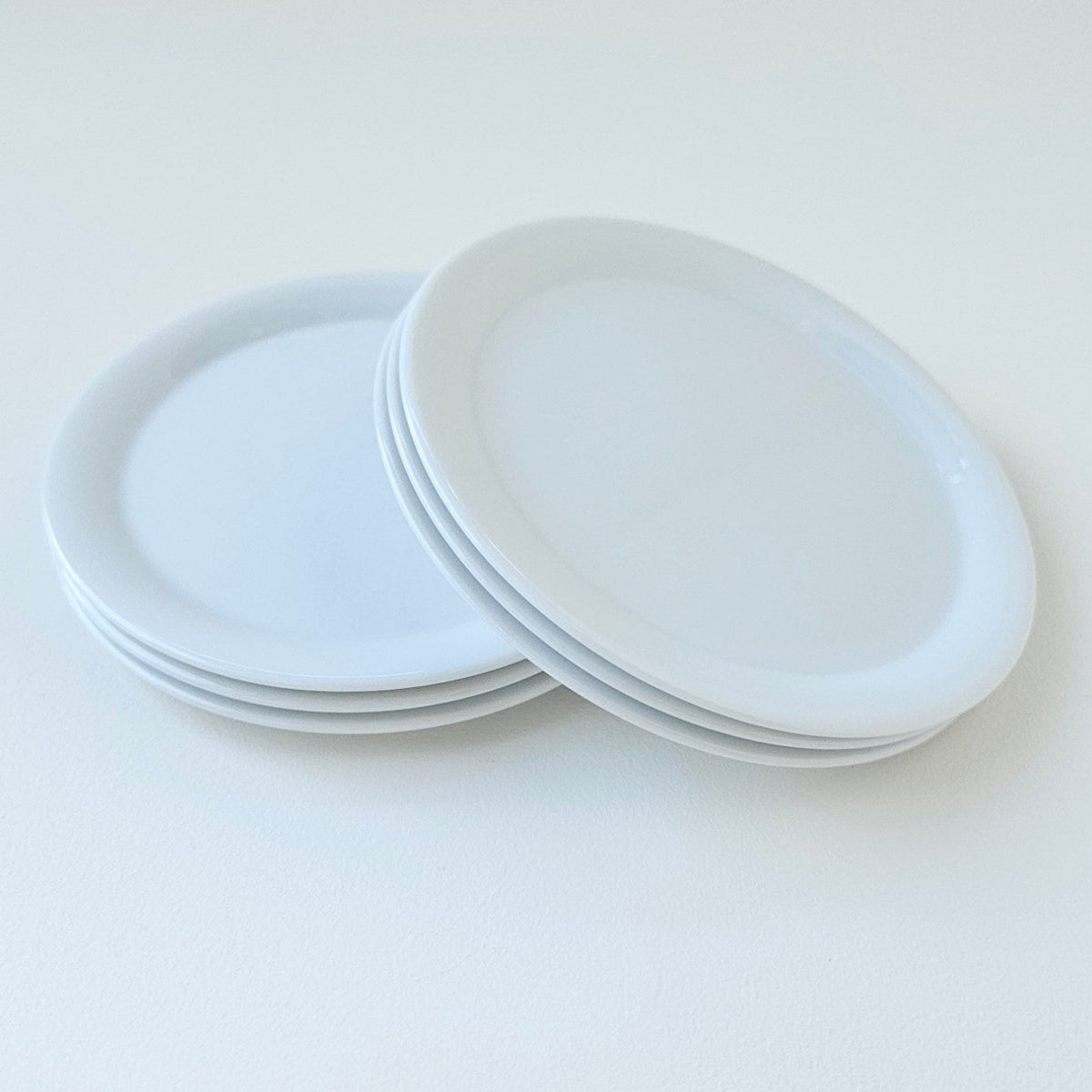 Suite de six assiettes à pain extra-plates – Manufacture Raynaud – Limoges, XXIe s.