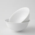 Lot de quatre bols en porcelaine fine – Contraste Émail / Biscuit – Saint-Léonard-de-Noblat, début du XXIe s..