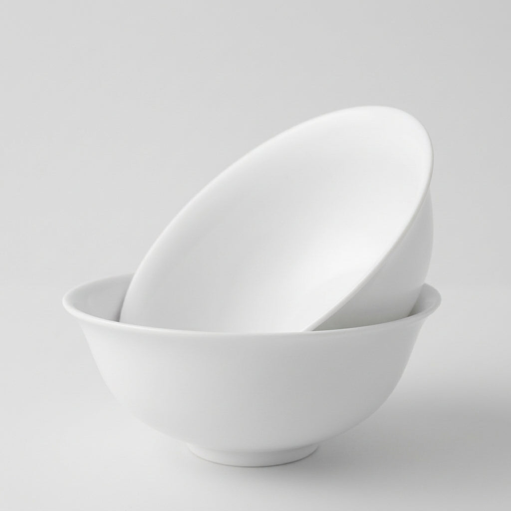 Lot de quatre bols en porcelaine fine – Contraste Émail / Biscuit – Saint-Léonard-de-Noblat, début du XXIe s..