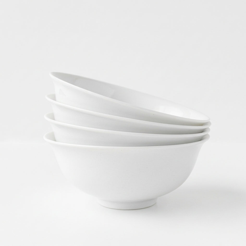 Lot de quatre bols en porcelaine fine – Contraste Émail / Biscuit – Saint-Léonard-de-Noblat, début du XXIe s..