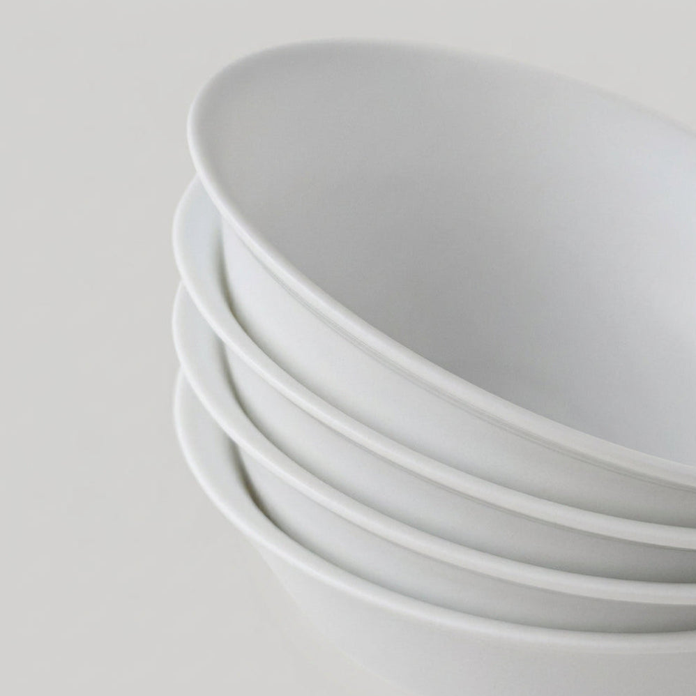 Lot de quatre bols en porcelaine fine – Contraste Émail / Biscuit – Saint-Léonard-de-Noblat, début du XXIe s..