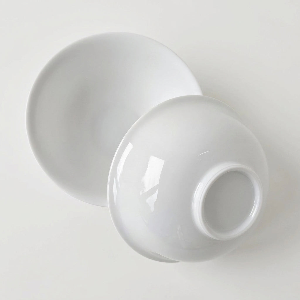 Lot de quatre bols en porcelaine fine – Contraste Émail / Biscuit – Saint-Léonard-de-Noblat, début du XXIe s..