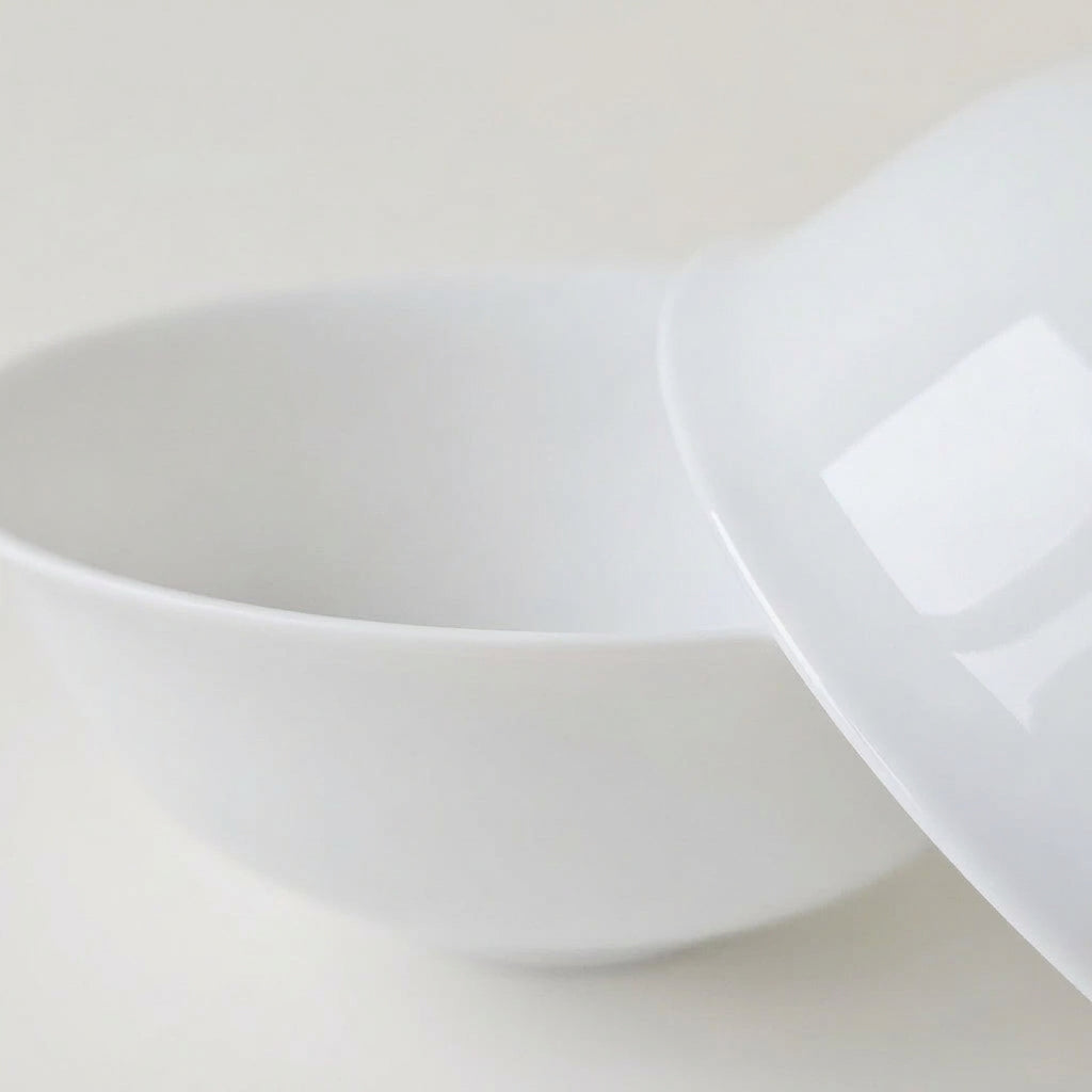 Lot de quatre bols en porcelaine fine – Contraste Émail / Biscuit – Saint-Léonard-de-Noblat, début du XXIe s..