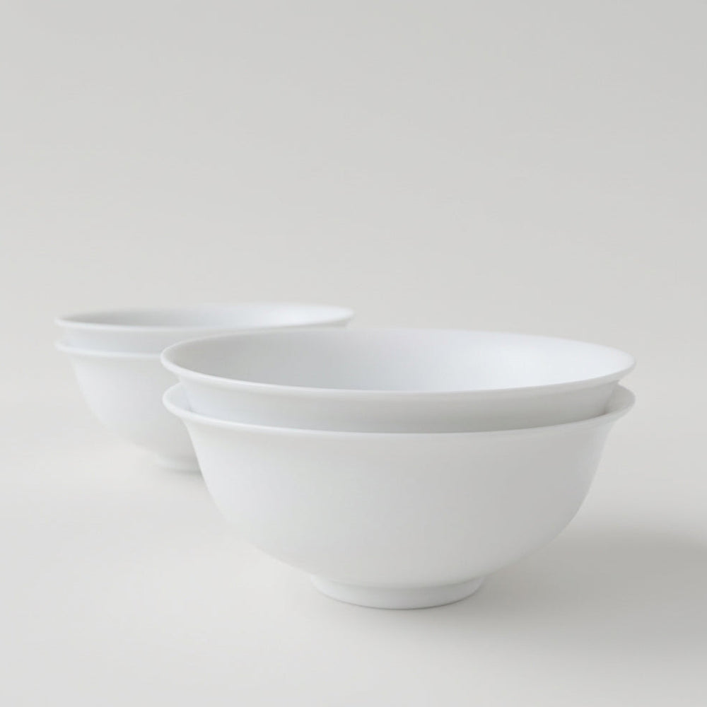 Lot de quatre bols en porcelaine fine – Contraste Émail / Biscuit – Saint-Léonard-de-Noblat, début du XXIe s..