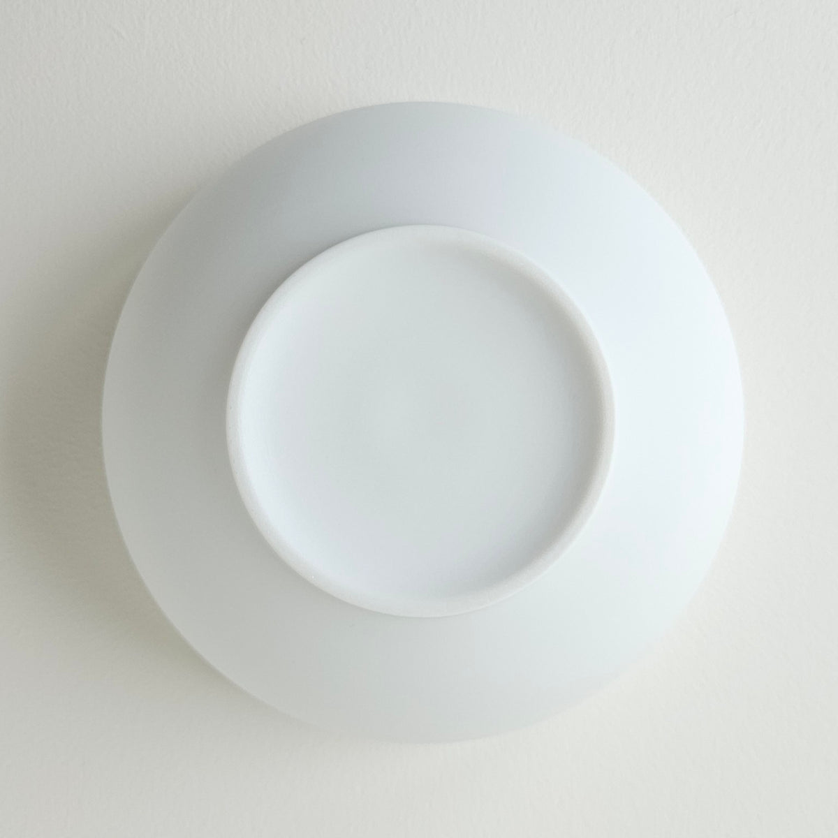 Lot de quatre bols en porcelaine fine – Contraste Biscuit / Émail – Saint-Léonard-de-Noblat, début du XXIe s.