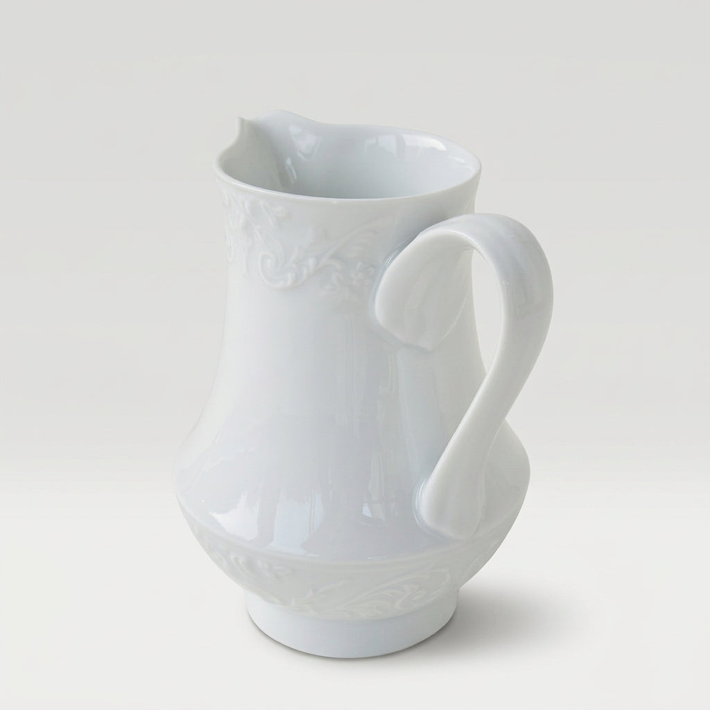 Crémier à décor en relief – Manufacture Raynaud – Limoges, fin du XXᵉ s.