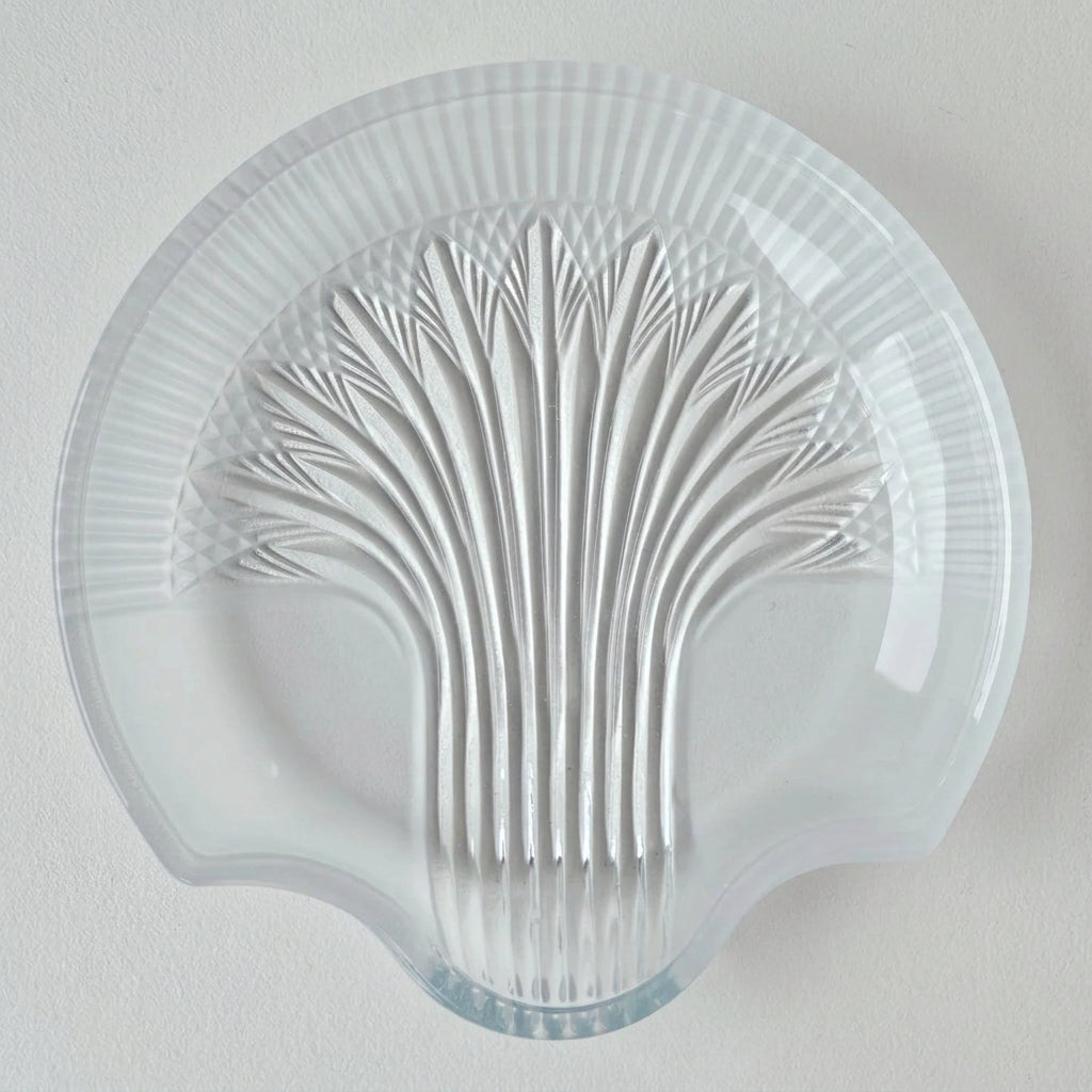 Dessous de bouteille en verre moulé à décor rayonnant – XXᵉ siècle
