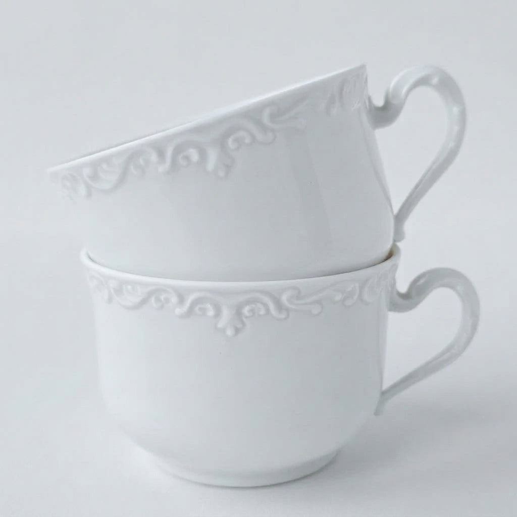 Paire de tasses à thé ou à chocolat chaud avec deux soucoupes assorties par association – Limoges, 2e moitié du XXᵉ s.