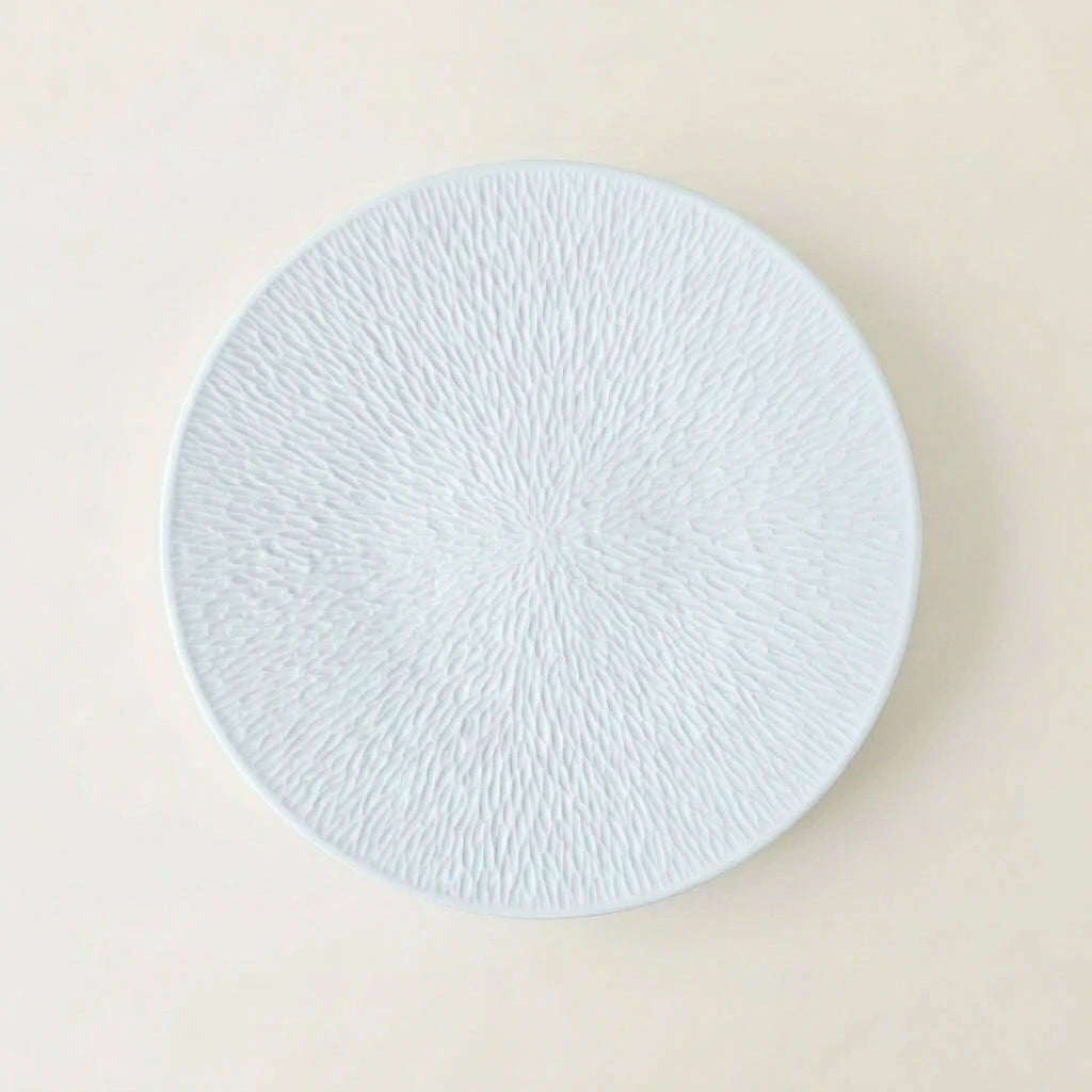 Suite de six assiettes à dessert – Minéral – Manufacture Raynaud – Limoges, début du XXIe s.