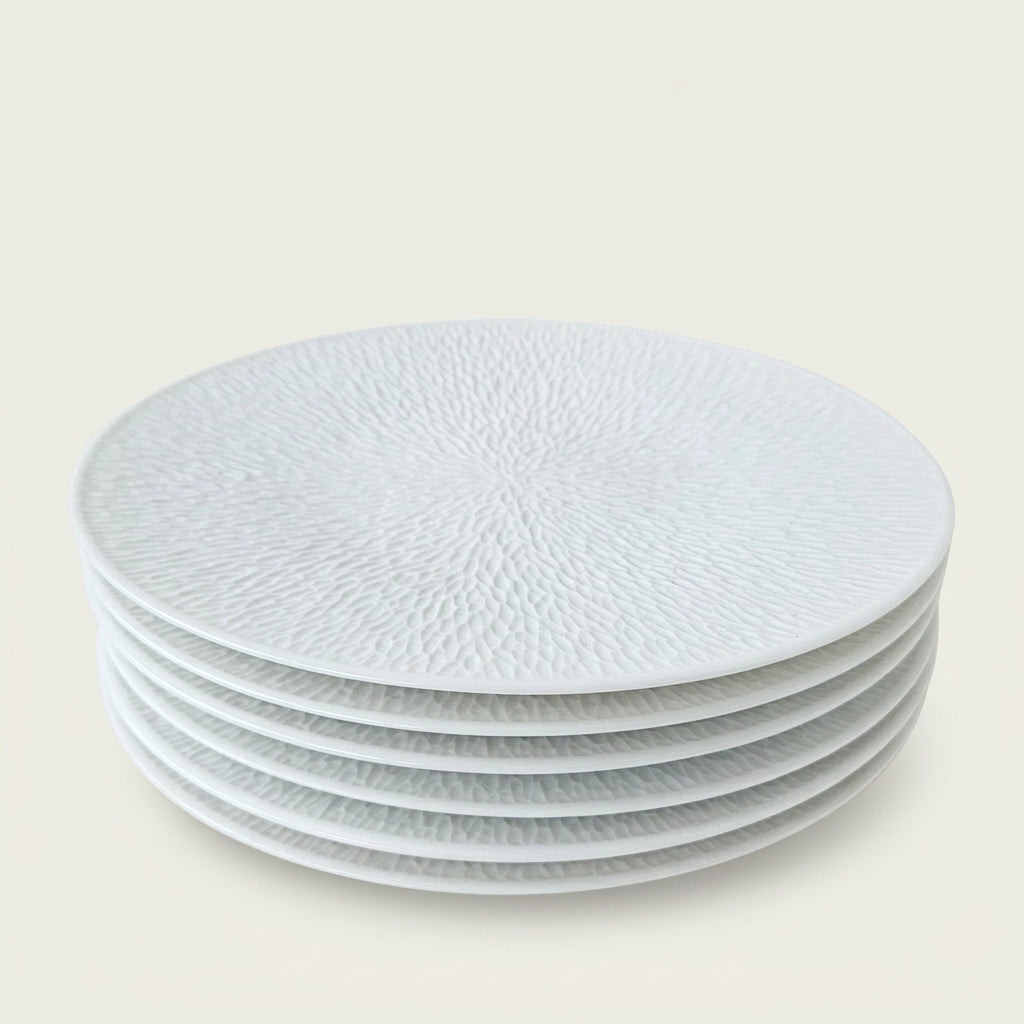 Suite de six assiettes à dessert – Minéral – Manufacture Raynaud – Limoges, début du XXIe s.