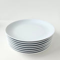 Suite de huit assiettes à déjeuner – Manufacture Raynaud – Limoges, début du XXIe s.