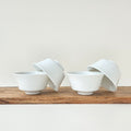 Quatre tasses à thé sans anse – Manufacture Raynaud – Limoges, XXIe s.